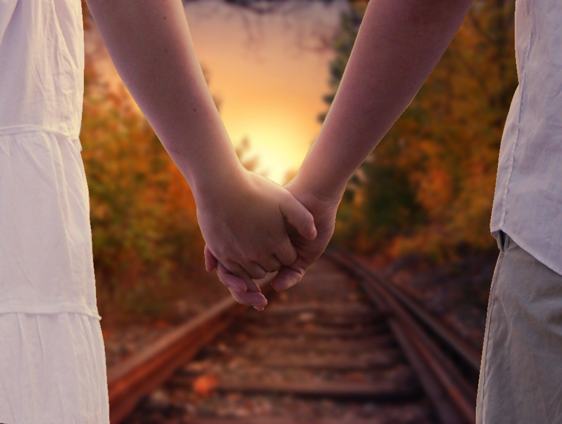 A lover's touch eases pain as heartbeats, breathing sync | CU ...